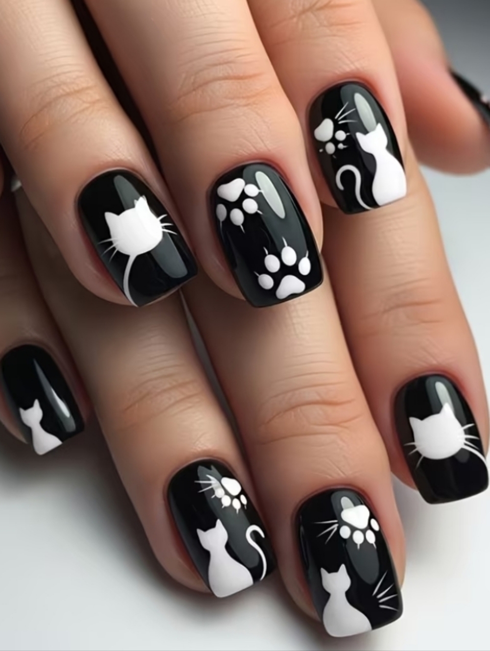Black & White Cats And  Paw Prints Preas On Nails